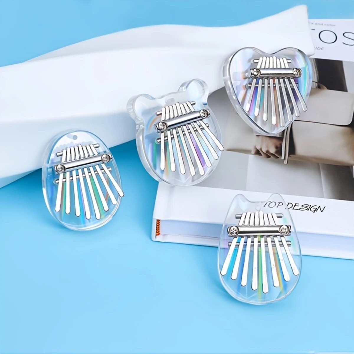 A Musical Instrument With Keys - イヤーミニカリンバ8キー,レインボーカラー,透明ハート,クリスタル,アクリル,サムピアノ,アコースティック,音楽楽器